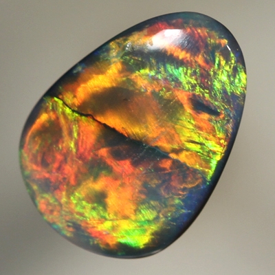SOLID BLACK OPAL Very bright neon rainbow broad rolling flash 